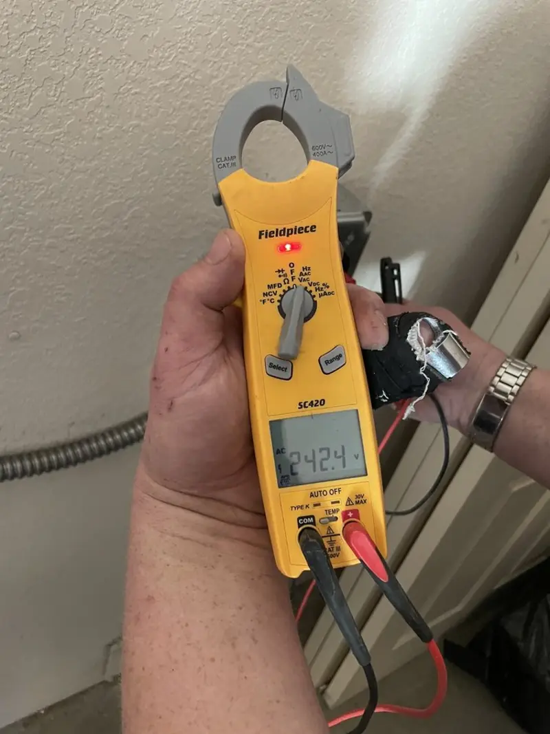 Voltage testing with clamp meter during Whole House Surge Protector in Grantville